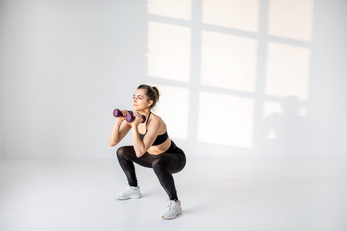 How to Do Dumbbell Squats Proper Form, Technique & Benefits