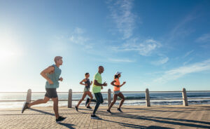 Group of beginner runners running outside