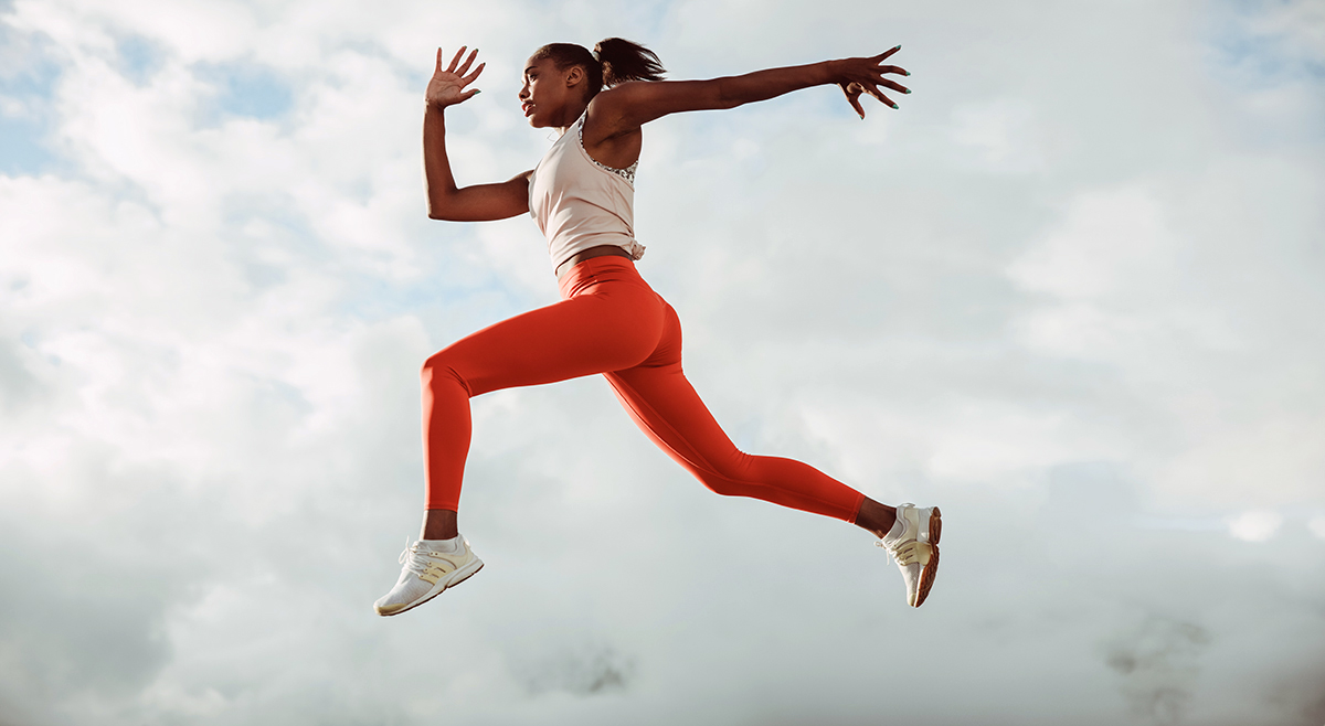 Woman with ectomorph body type jumping