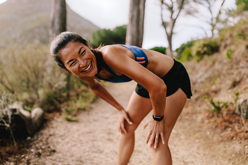 Female runner taking break from fartllek workout