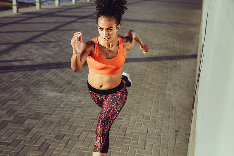 Woman doing HIIT Running Workout