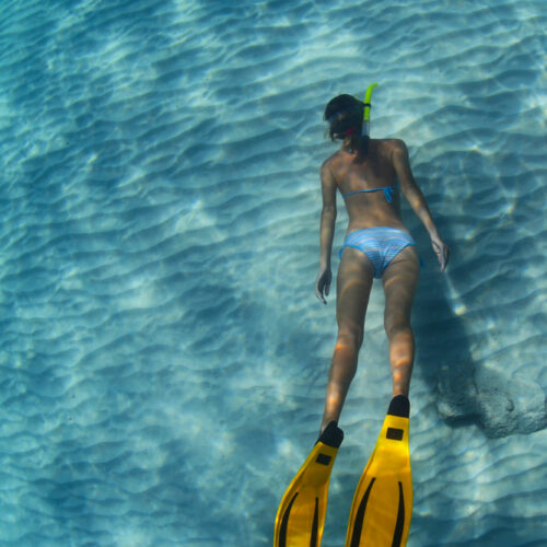 Woman snorkelling in the ocean